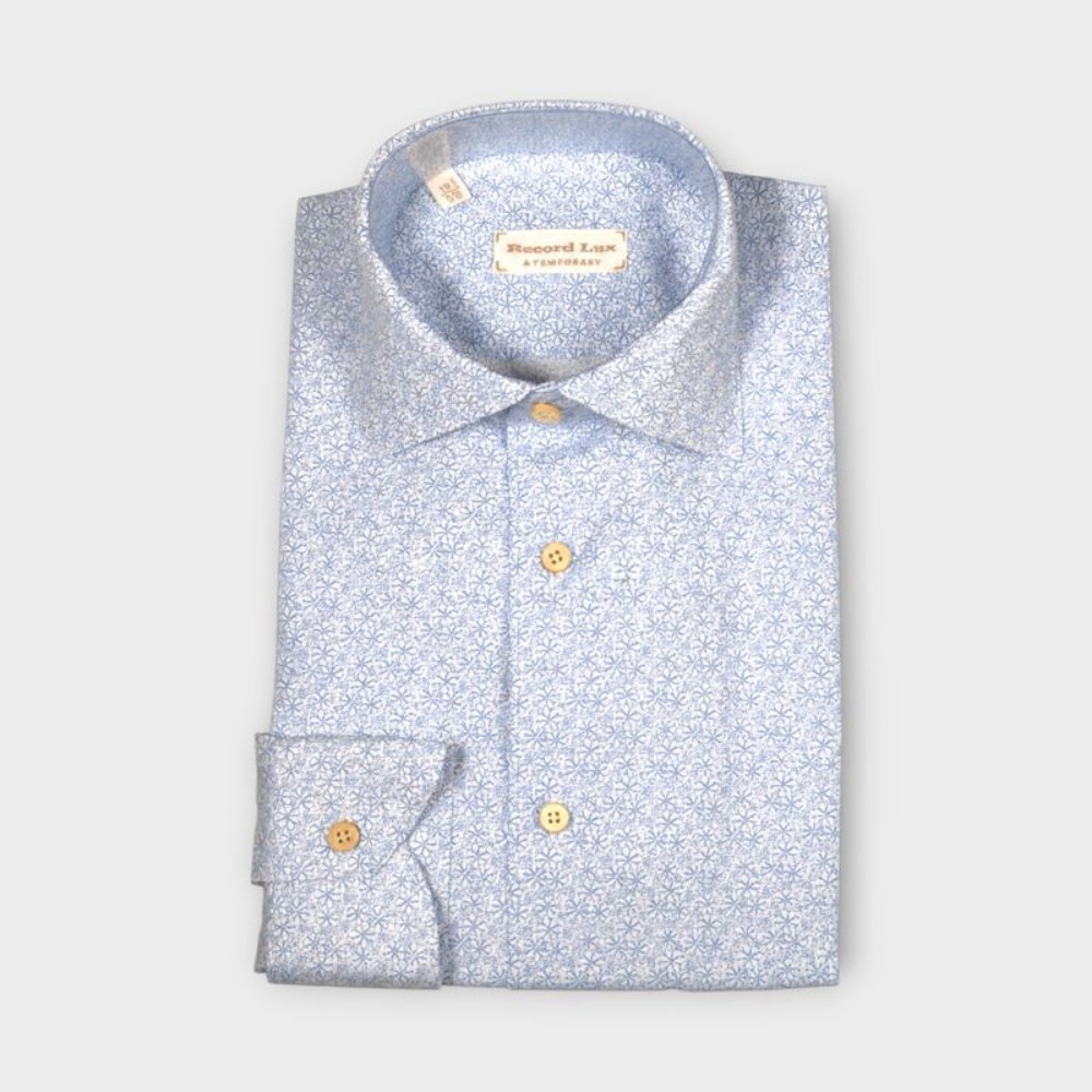 Immagine di Camicia in cotone bianca con fantasia a fiori azzurra