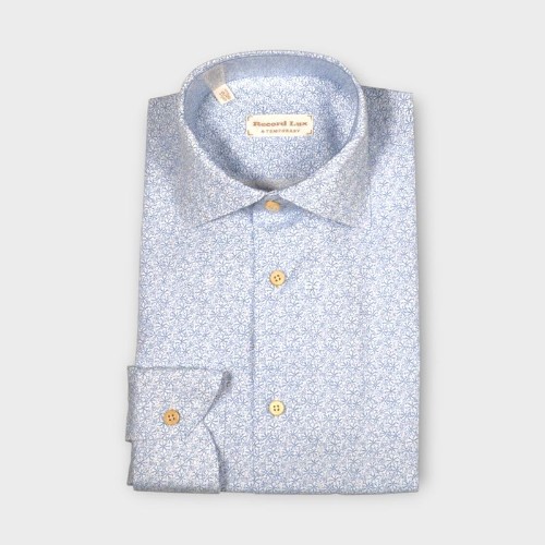 Immagine di Camicia in cotone bianca con fantasia a fiori azzurra