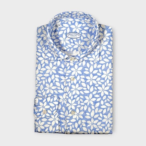 Immagine di Camicia in cotone azzurra con fantasia floreale bianca
